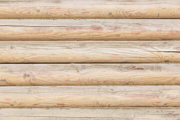 A wall of logs. Background for the design.
