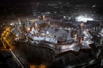 Panorama of Wawel Royal Castle at night during winter, Krakow, Poland