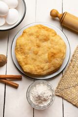 Christmas fritters with piloncillo and cinnamon on a white background. Mexican food