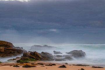 Rocks and waves - sunrise seascape at Bermagui
