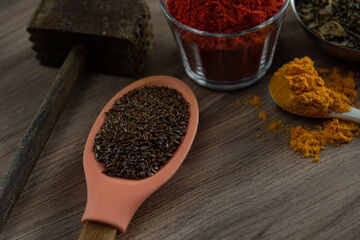 Ground red culinary condiment made from annatto (Bixa orellana)