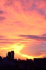 Obraz na płótnie Canvas dramatic Sunset sky range beautiful landscape dusk golden time vibrant sky. Beautiful landscape vivids panorama scenery dawn dramatic sky timelapse. Sunrise landscape golden sky sunlight