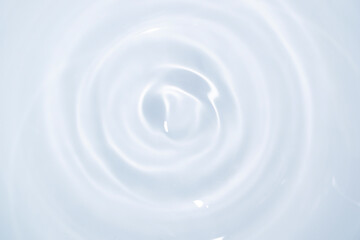 Water drops falling on water surface for beauty background concept