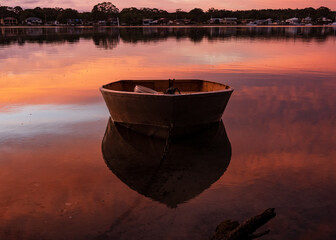 boat with a pink lake
