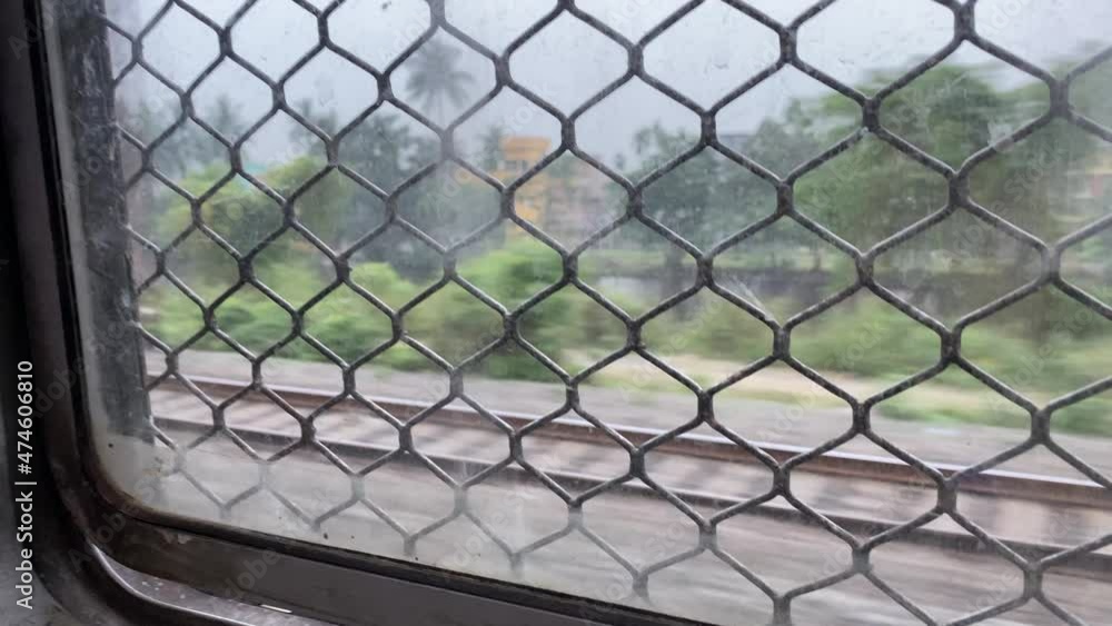 Poster view from local running train window in kolkata, west bengal. beautiful city view from running train