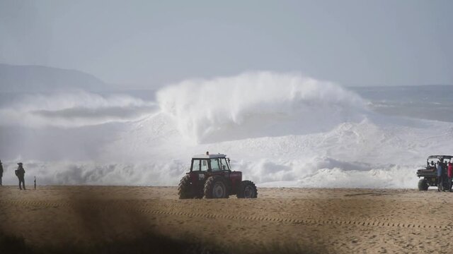 Slow motion of a wave break on the beach in Nazar&eacute;, Portugal. Nazar&eacute; is a small village in Portugal with the biggest waves in the world.