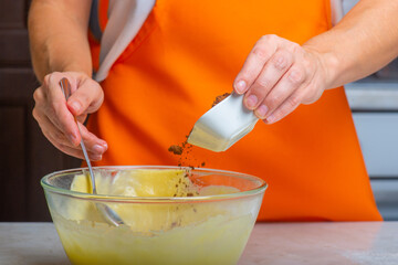 cocoa is poured into a cup with ingredients for the pie