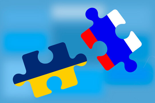 the flag of Ukraine and the flag of Russia in the form of puzzles on a blue background, the concept of economic, financial, political and military relations between the two countries.