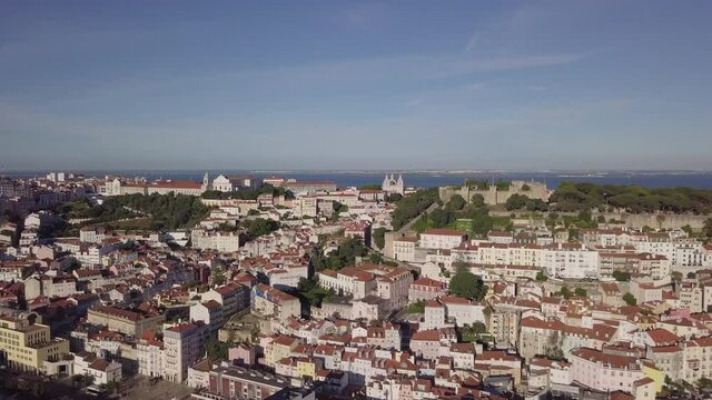Aerial drone shot flying over downtown Lisbon in Portugal.
