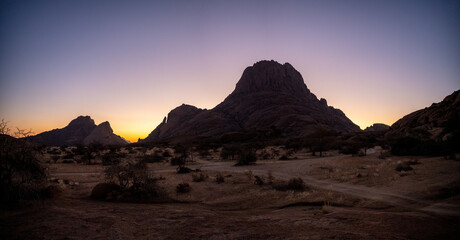 Naklejka premium A Spitzkoppe mountain at sunset, Namibia