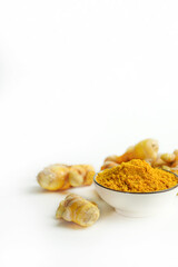 Fresh turmeric on white background,raw material for cooking. Close up.