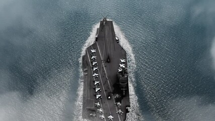 Aircraft carrier crossing the ocean Aerial view
High altitude view of Aircraft carrier in the ocean
