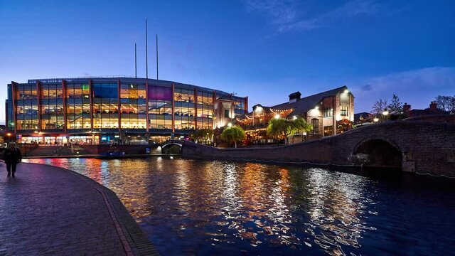 Birmingham night city timelapse. View of the Canal Quarter at blue hour. England, UK
