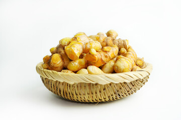 Fresh turmeric on white background,raw material for cooking. Close up.