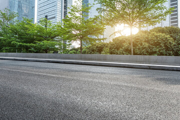 Asphalt road and modern commercial building landscape in Shenzhen