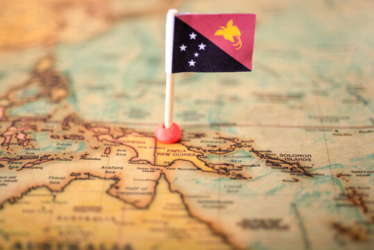 flag of Papua New Guinea, on the world map. - Powered by Adobe