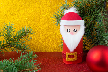 Handmade craft project from toilet tube. Creative kids DIY New year. Cute Santa Claus for Christmas party