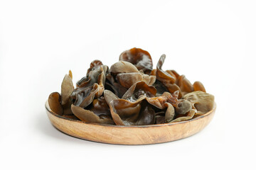 Fresh wood ear nushroom on white background,raw material for cooking. Close up.