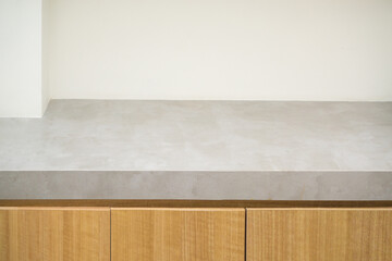 empty grey marble table top with white concrate wall texture background