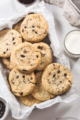 Cookies are in the tray with a glass of milk. - 474619858