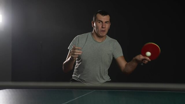 table tennis. man a athlete playing ping pong. sport party tournament concept. sportsman man training lifestyle playing table tennis. forehand and backhand exercise in ping pong