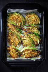 Baked savoy cabbage with parmesan cheese, honey and spices