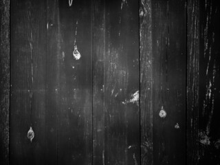 Scary dark wall black and white cracked worn wooden board texture for background planks grey texture