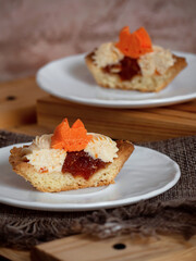 cakes with sweet cream on plates
