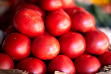 Ripe red tomato close-up. Vegetables and diet.