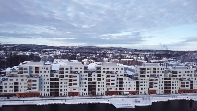 Vimpeln in Alings&aring;s K&ouml;pcenter. Showcasing the newly built apartments from the lake. Shot during the winter.