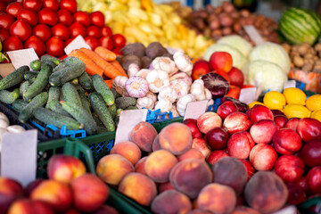 Farmers' market with vegetables and fruits.