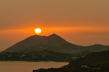 Famous sunset at Sounio in Greece. 
