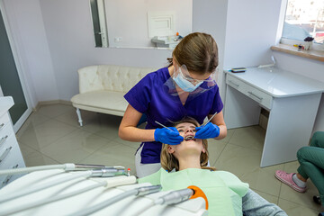 young woman with problem teeth came to the dentist to treat teeth.