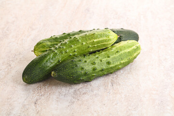 Fersh juicy green cucumbers heap