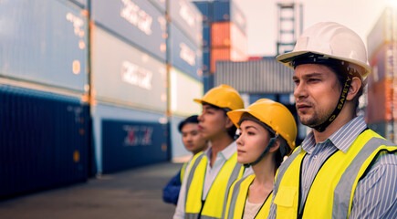 Professional engineer group in container yard.