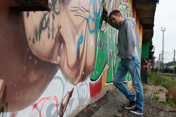 a young man in a hoodie hip-hop