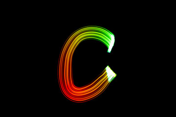Letter C. Isolated figure on a black background. Freezelight.