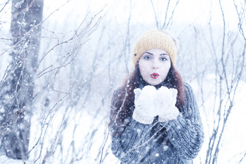 Beautiful girl in a beautiful winter snow