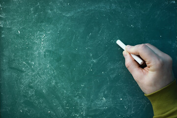 Chalkboard. Crayons for writing on a blackboard. Learning concept. School teaching chalk board.