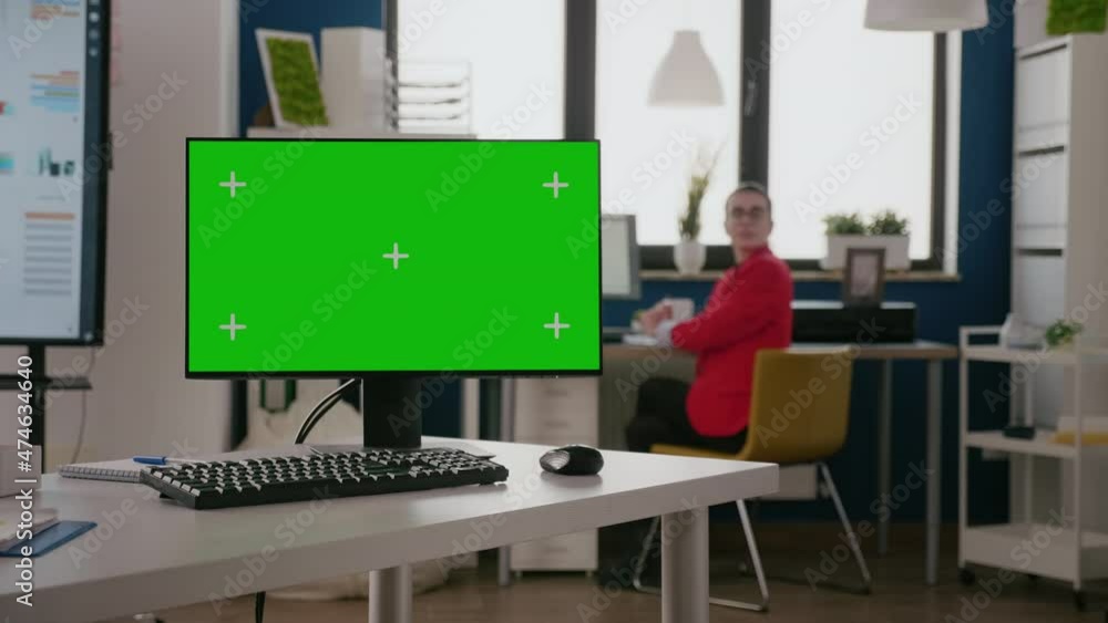 Poster green screen on computer in business office. empty desk with chroma key template and isolated mock u