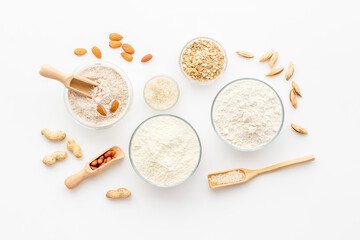 Bowls of various gluten free flour - almond peanut oat and rice buckwheat flour