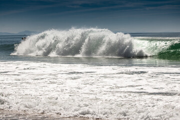 beautiful breaking wave close up in atlantic ocean