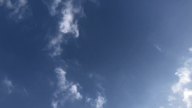 Passenger jet passing overhead at low altitude.