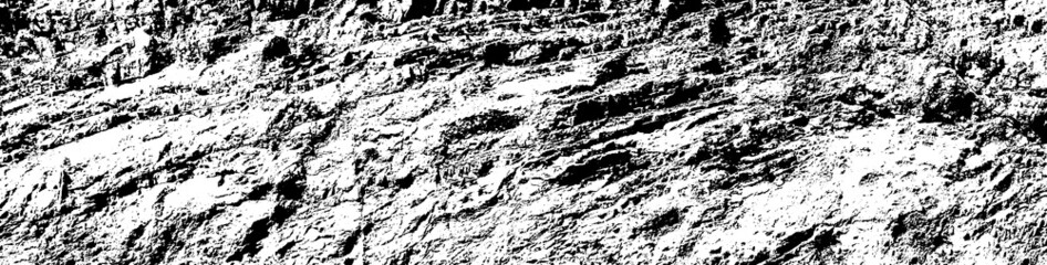 Grungy cragged bumpy pitted cavity stone facade, split layer gap.Ruined cracked shattered worn rough hiking canyon.Old ragged grunge steep marble cliff. Grand vintage crannied damaged impressive gorge