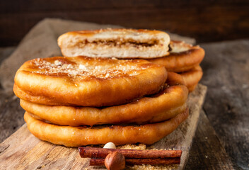 Korean street food hotteok. Fried dough stuffed with nuts and sugar.