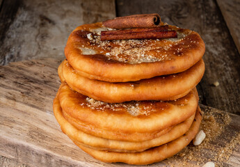 Korean street food hotteok. Fried dough with different fillings. Close-up.