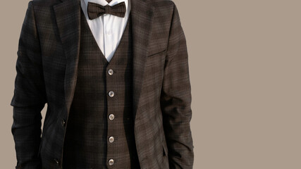 Classic male suit on a grey background with a copyspace on the right - 474643879
