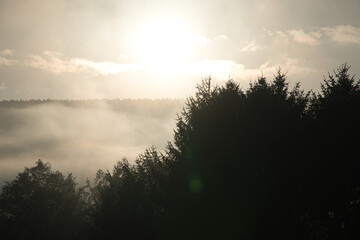 sunrise with fog in the early morning hours.