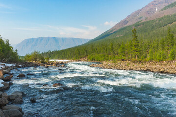River Hoisey. Polar day on Putorana Plateau, Russia