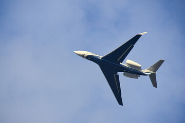 plane in the blue sky to the vacation destination